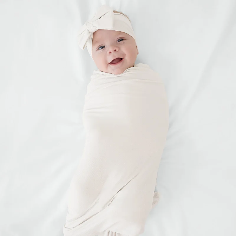 White Sand Ribbed Swaddle & Luxe Bow Headband Set